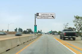 Can you exit the carpool lane at anytime in California?